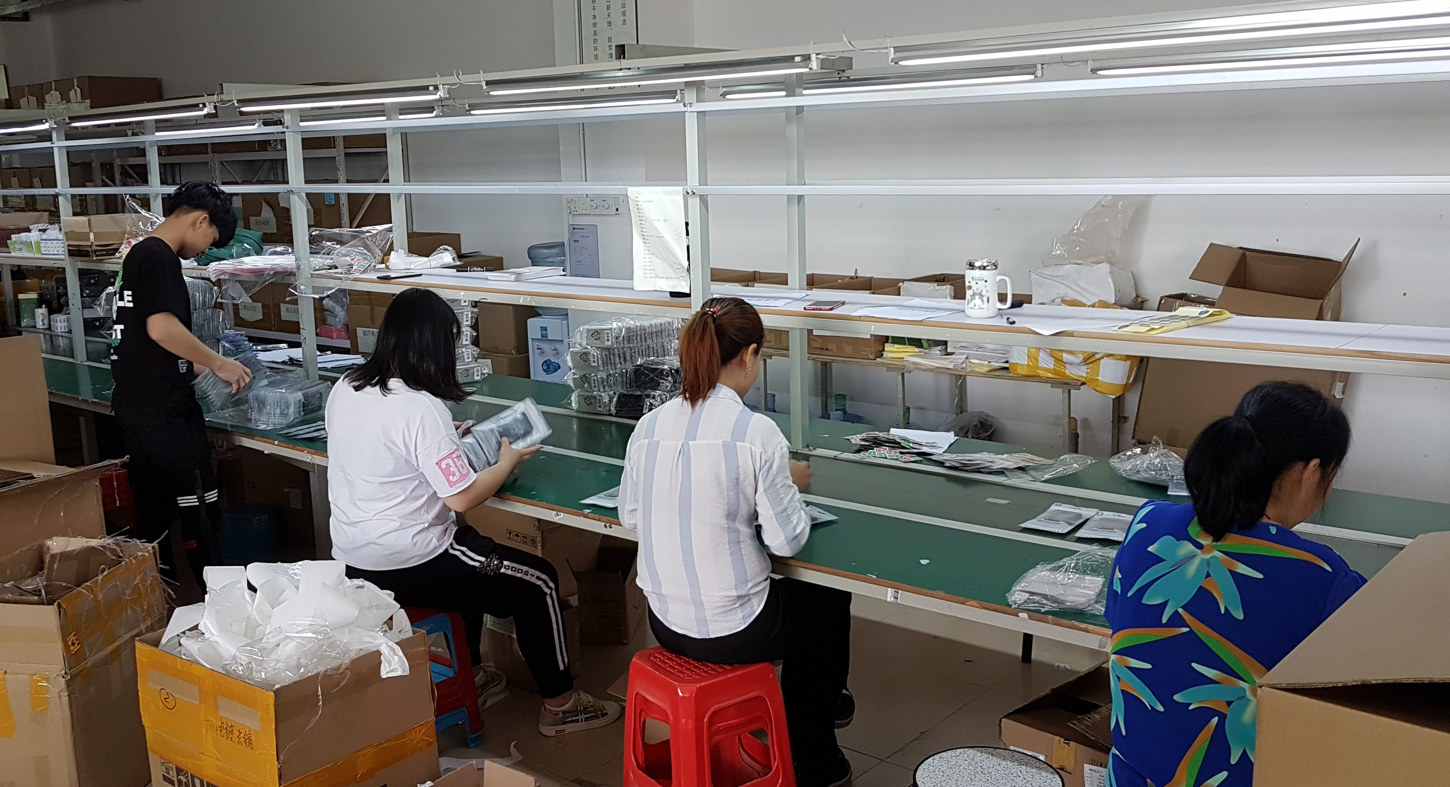 Inventus principal on the factory floor reviewing production with a manufacturing partner.